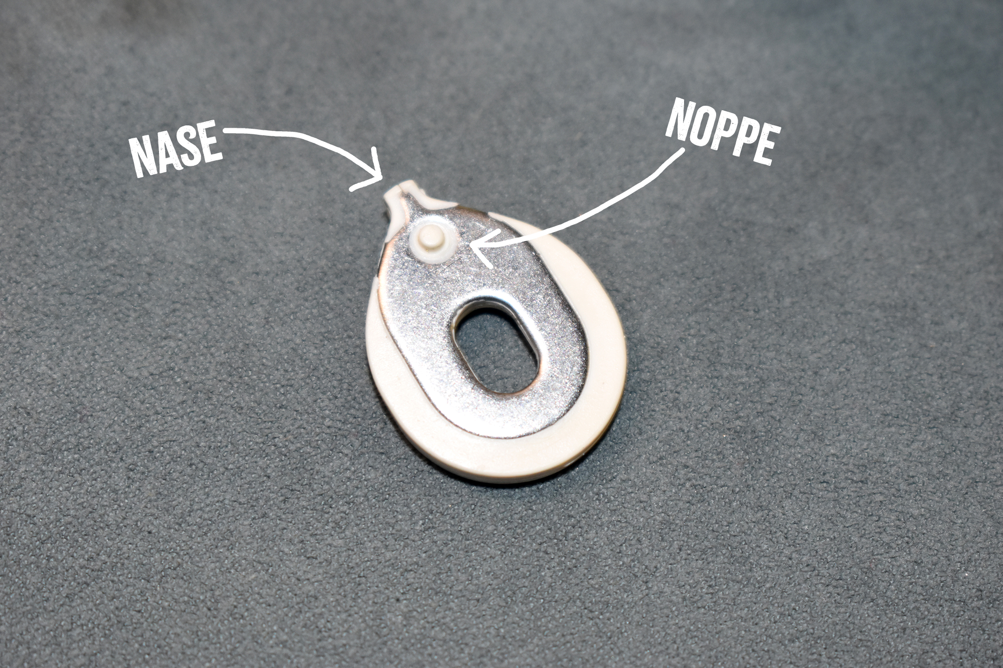 Nahaufnahme der Unterseite der Kunststoffführung des Pumpventils