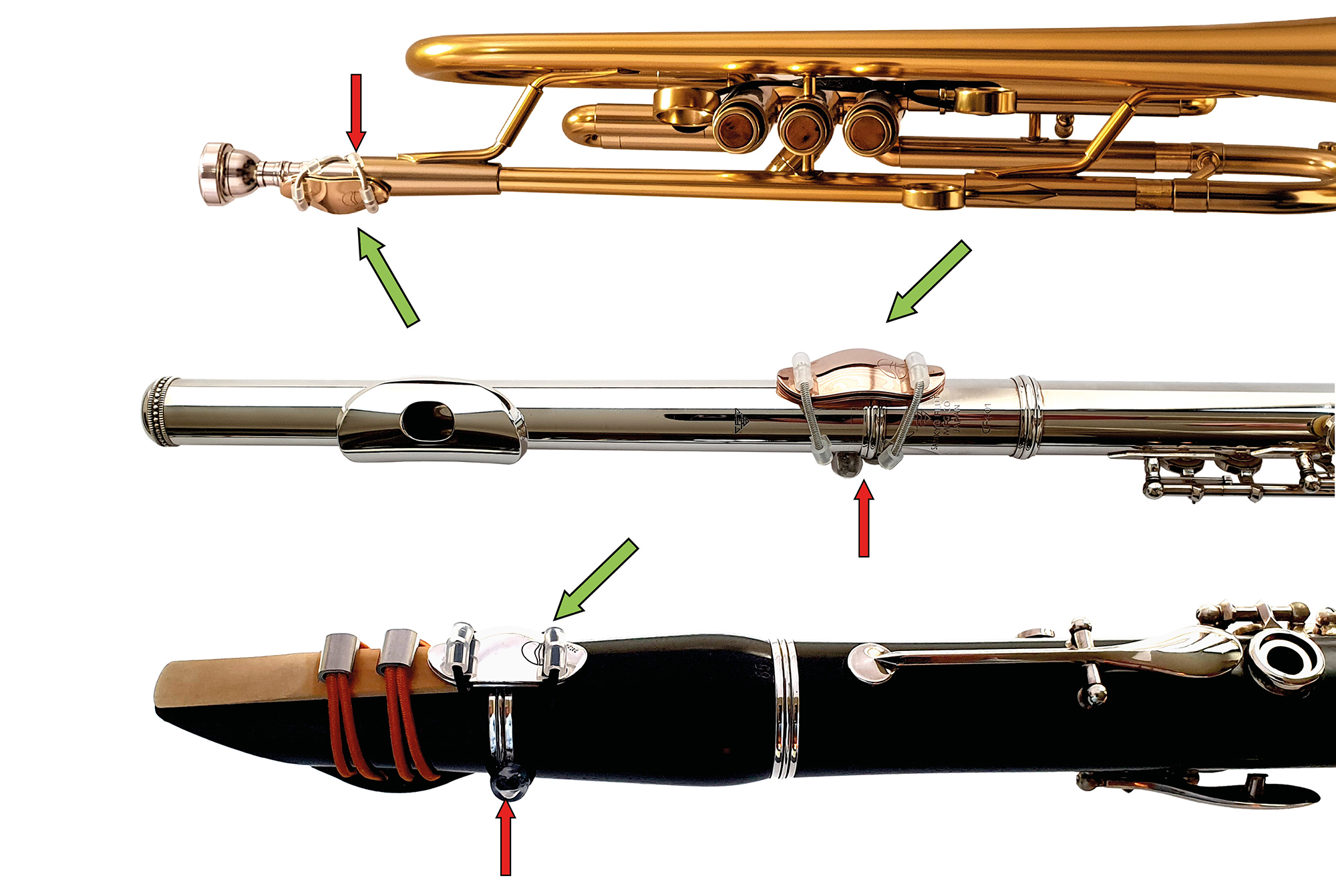 Eine Trompete, eine Querflöte und eine Klarinette, die jeweils mit einer Klangbrücke versehen sind.